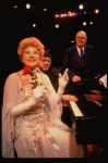 Entertainer the "Incomparable" Hildegarde (L) & announcer Don Wilson (R) in a scene fr. the concert "Big Broadcast of 1944." (Westbury)
