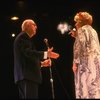 Actress Travis Hudson (R) & announcer Don Wilson (L) in a scene fr. the concert "Big Broadcast of 1944." (Westbury)