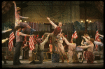 Actor Harvey Evans (C) w. cast in a scene fr. the Bus & Truck tour of the Broadway musical "Barnum." (New York)