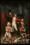 Actor Harvey Evans (C) w. cast in a scene fr. the Bus & Truck tour of the Broadway musical "Barnum." (New York)