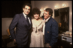 L-R) Singer Placido Domingo, actress Linda Ronstadt & producer Joseph Papp backstage at the New York Shakespeare Festival production of the musical "La Boheme." (New York)