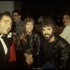 Actor Gary Morris (R) being congratulated by dancer Natalia Makarova (C) at the opening night party for the New York Shakespeare Festival production of the musical "La Boheme." (New York)