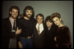 L-R) Actors David Carroll & Gary Morris, producer Joseph Papp, & actresses Linda Ronstadt & Patti Cohenour at the opening night party for the New York Shakespeare Festival production of the musical "La Boheme." (New York)