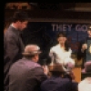 Actors (L-2L, facing camerapeople) Lauree Taradash & Joe Warren Davis w. cast in a scene fr. the National tour of the musical, "Buddy." (Hartford)