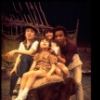 Actor Al Freeman, Jr. (R) w. children in a scene fr. the Broadway musical "Look to the Lilies." (New York)