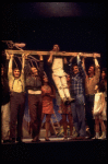 Actor Al Freeman, Jr. (C) w. cast in a scene fr. the Broadway musical "Look to the Lilies." (New York)