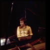 Actor Dudley Moore playing the piano in a scene fr. the Broadway comedy "Good Evening." (New York)