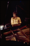 Actor Dudley Moore playing the piano in a scene fr. the Broadway comedy "Good Evening." (New York)