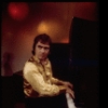 Actor Dudley Moore playing the piano in a scene fr. the Broadway comedy "Good Evening." (New York)