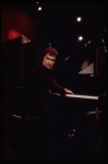 Actor Dudley Moore playing the piano in a scene fr. the Broadway comedy "Good Evening." (New York)