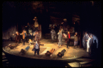 Actor Robert Shaw (kneeling C) w. cast in a scene fr. the Broadway musical "Gantry." (New York)