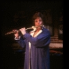 Actress Kaye Ballard playing the flute in a scene fr. her one-woman Off-Broadway musical "Hey Ma!." (New York)