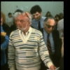 Director Hal Prince examining costume renderings at the first rehearsal of the Broadway musical "A Doll's Life." (New York)