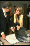 Producer Martin Richards & costume designer Florence Klotz discussing design renderings at the first rehearsal of the Broadway musical "A Doll's Life." (New York)