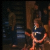 Actors Lonny Price (3L) & Ann Morrison (3R) w. cast in a scene fr. the Broadway musical "Merrily We Roll Along." (New York)