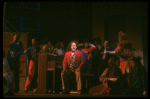 Actor Lonny Price (C) w. cast in a scene fr. the Broadway musical "Merrily We Roll Along." (New York)