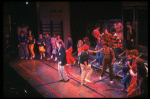 Actor Jim Walton (C) w. cast in a scene fr. the Broadway musical "Merrily We Roll Along." (New York)
