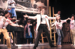 Actor Jim Walton (C) w. cast in a scene fr. the Broadway musical "Merrily We Roll Along." (New York)