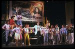 Actor Jim Walton (C) w. cast in a scene fr. the Broadway musical "Merrily We Roll Along." (New York)