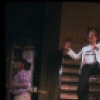 Actor Jim Walton (C) w. cast in a scene fr. the Broadway musical "Merrily We Roll Along." (New York)