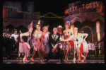 Actor Peter Allen (C) w. dancers in a scene fr. the Broadway musical "Legs Diamond." (New York)