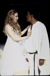 Actors Kathryn Meisle & Raul Julia in a scene fr. the New York Shakespeare Festival production of the play "Othello" at the Delacorte Theater in Central Park. (New York)