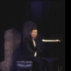 Conductor Peter Howard at piano in a scene fr. the Broadway musical revue "Jerome Kern Goes to Hollywood." (New York)