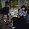 Actresses (Top L-R) Leslie Uggams, Carol Channing & Andrea McArdle w. composer Jerry Herman at piano in a publicity shot fr. the National tour of the musical revue "Jerry's Girls." (New York)