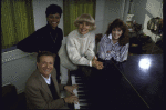 Actresses (Top L-R) Leslie Uggams, Carol Channing & Andrea McArdle w. composer Jerry Herman at piano in a publicity shot fr. the National tour of the musical revue "Jerry's Girls." (New York)