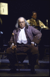 Actor (fr., C) Rex Everhart w. (back) David Ford in a scene fr.  touring production of the musical "1776." (New York)