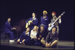 Actors (fr., seated) Lenny Baker, Ilene Graff, Joanna Gleason and James Naughton being accompanied by musicians (back, L-R) Ken Bichel, Michael Mark, Joseph Saulter and John Miller in a scene from the Broadway musical "I Love My Wife." (New York)