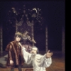 Actors (fr.) Michael John & Tom Aldredge w. (back, on throne)  Penny Fuller in a scene fr. the Broadway musical "Rex." (New York)