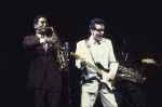 Actor Paul Hipp (R) as Buddy Holly w. cast member in a scene fr. the Broadway musical "Buddy." (New York)
