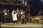 Actor Brian Murray (seated) with cast members in a scene from the New York Shakespeare Festival production of the play "The Merry Wives of Windsor" at the Delacorte Theatre in Central Park (New York)