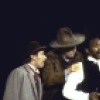 Actor Reggie Montgomery (C) with cast members in a scene from the New York Shakespeare Festival production of the play "The Merry Wives of Windsor" at the Delacorte Theatre in Central Park (New York)