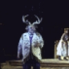 Actor (L, wearing antlers) Brian Murray with cast members in a scene from the New York Shakespeare Festival production of the play "The Merry Wives of Windsor" at the Delacorte Theatre in Central Park (New York)
