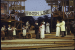 Actors Brian Murray and Tonya Pinkins with cast members in a scene from the New York Shakespeare Festival production of the play "The Merry Wives of Windsor" at the Delacorte Theatre in Central Park (New York)
