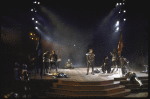 Actor Kevin Kline (C) w. cast members in a scene fr. the New York Shakespeare Festival production of the play "Henry V" at the Delacorte Theatre in Central Park. (New York)