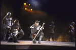 Actor Kevin Kline (C) w. cast members in a scene fr. the New York Shakespeare Festival production of the play "Henry V" at the Delacorte Theatre in Central Park. (New York)