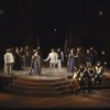 Actors (C) Mary Elizabeth Mastrantonio & Kevin Kline w. cast members in a scene fr. the New York Shakespeare Festival production of the play "Henry V" at the Delacorte Theatre in Central Park. (New York)