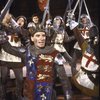 Actor Kevin Kline (C) w. cast members in a scene fr. the New York Shakespeare Festival production of the play "Henry V" at the Delacorte Theatre in Central Park. (New York)