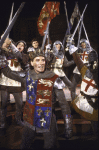 Actor Kevin Kline (C) w. cast members in a scene fr. the New York Shakespeare Festival production of the play "Henry V" at the Delacorte Theatre in Central Park. (New York)