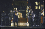 Actors (C, L-R) Michael Louden and Jordan Lund with cast members in a scene from the New York Shakespeare Festival production of the play "King John" at the Delacorte Theatre in Central Park (New York)