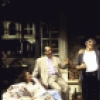 Actors (L-R) Julie Dretzin, Robert Klein, Patrick Fitzgerald, John Vickery, Jane Alexander (seated), Frances McDormand and Madeline Kahn in a scene from the Lincoln Center Theater production of the play "The Sisters Rosensweig" (New York)
