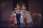 Actor Pat Hingle (C) with cast members in a scene from the Broadway musical "The Selling Of The President" (New York)