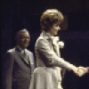 Actors Richard Goode (L) and Barbara Barrie (2L) with cast members in a scene from the Broadway musical "The Selling Of The President" (New York)