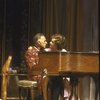 Actors Elizabeth Taylor & Richard Burton in a scene fr. the Broadway production of the play "Private Lives." (New York)