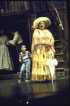 Actress Myra Merritt (C) w. cast members in a scene fr. the Houston Grand Opera production on Broadway of the opera "Porgy And Bess." (New York)