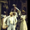 Actor Donnie Ray Albert (fr.) w. cast members in a scene fr. the Houston Grand Opera production on Broadway of the opera "Porgy And Bess." (New York)