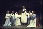 Actress Delores Ivory-Davis (C, standing) w. cast members in a scene fr. the Houston Grand Opera production on Broadway of the opera "Porgy And Bess." (New York)